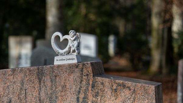 Angel with heart on gravestone