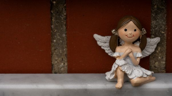 Cheerful Angel Figurine